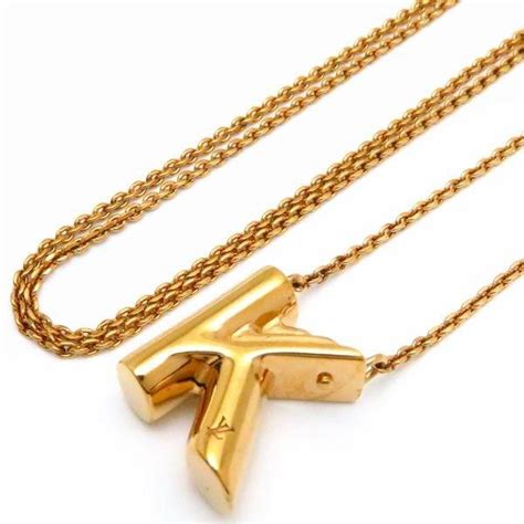 louis vuitton alphabet necklace price|Louis Vuitton letter c necklace.